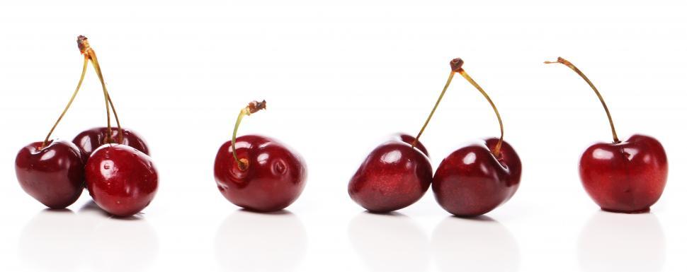 Free Image of Delicious row of ripe red cherries in a row 