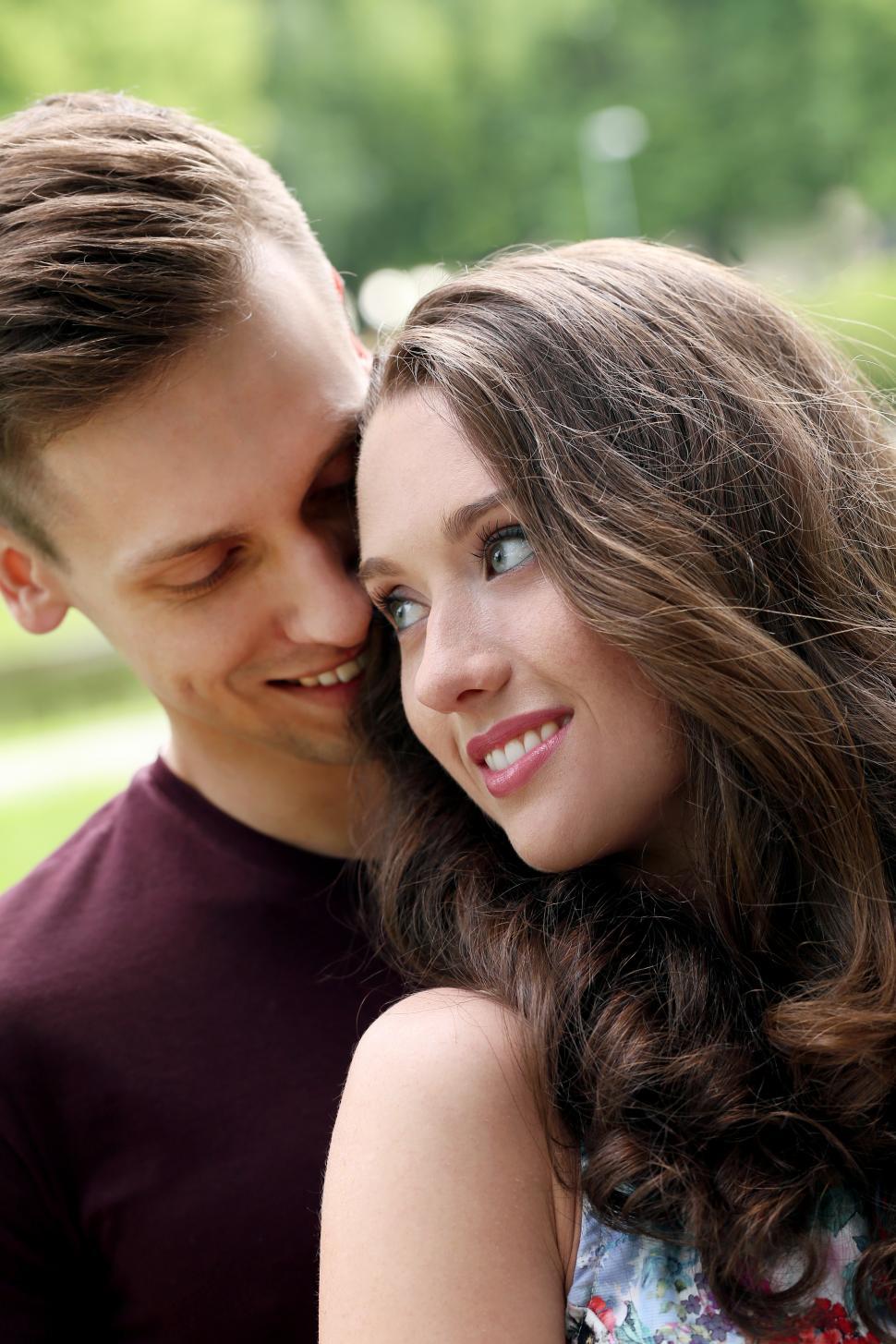 Free Image of Beautiful couple share a moment in the park 