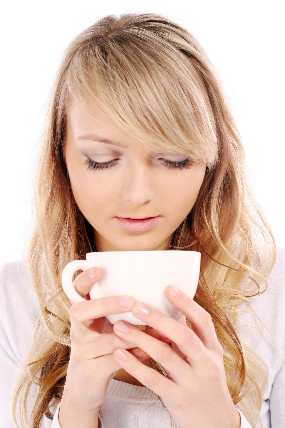 Free Image of young and beautiful caucasian girl with beverage 