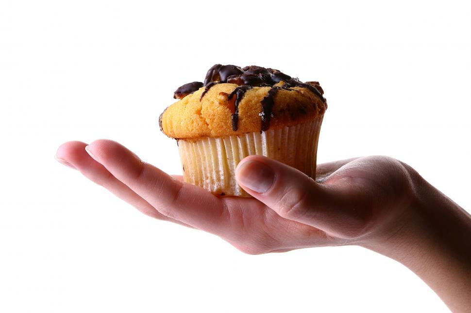 Free Image of hand with cupcake 