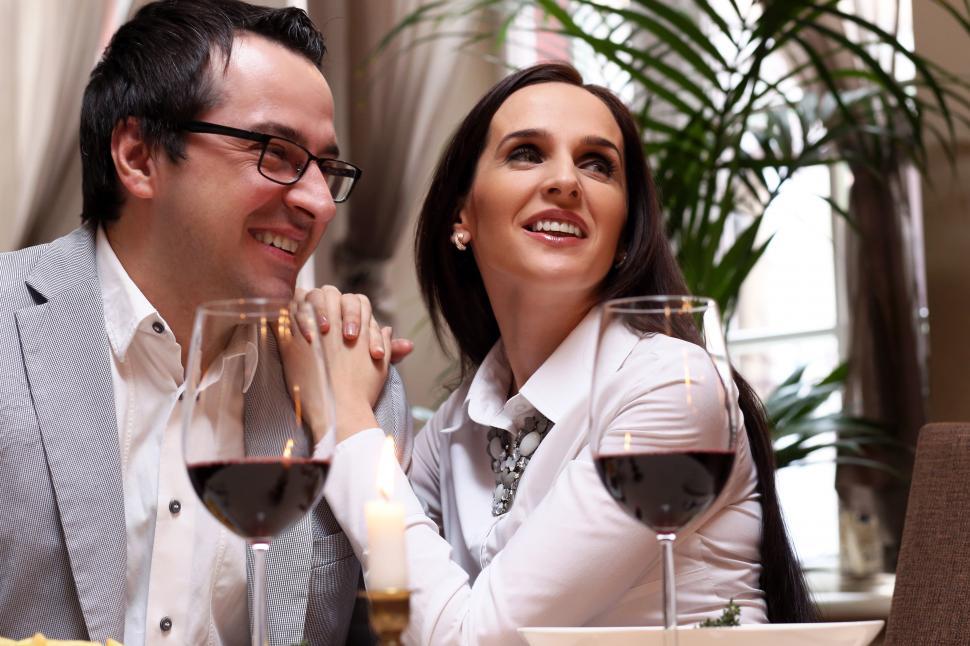 Free Image of Beautiful couple at fancy dinner 