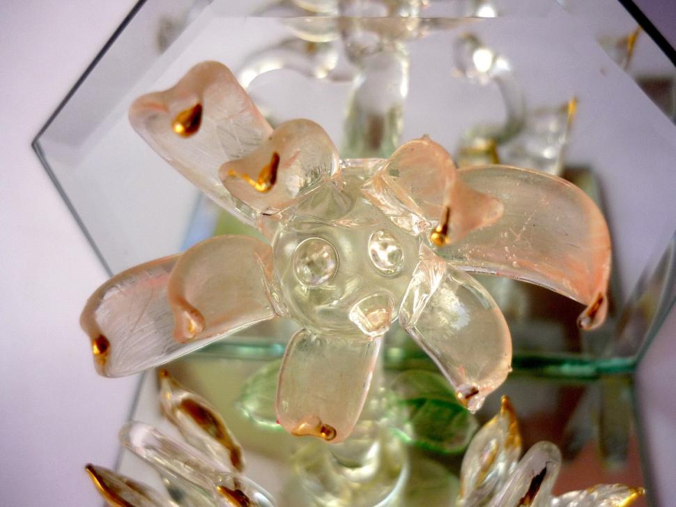 Free Image of Glass Sculpture of a Flower on a Table 