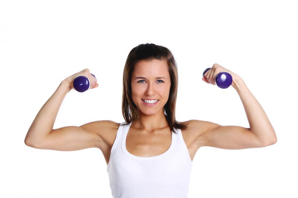 Free Image of Young girl with small weights 