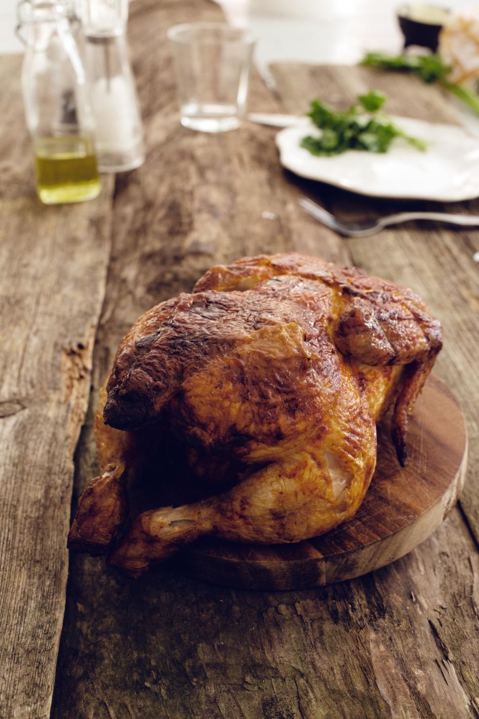 Free Image of Full grilled chicken on a table 