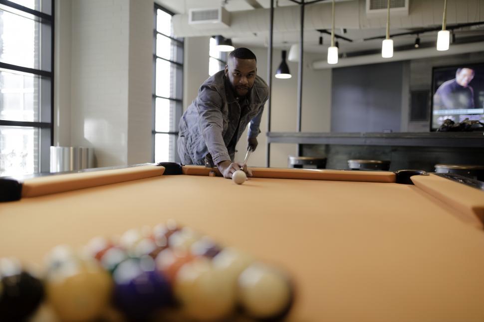Free Image of Young Man Playing Billiards 