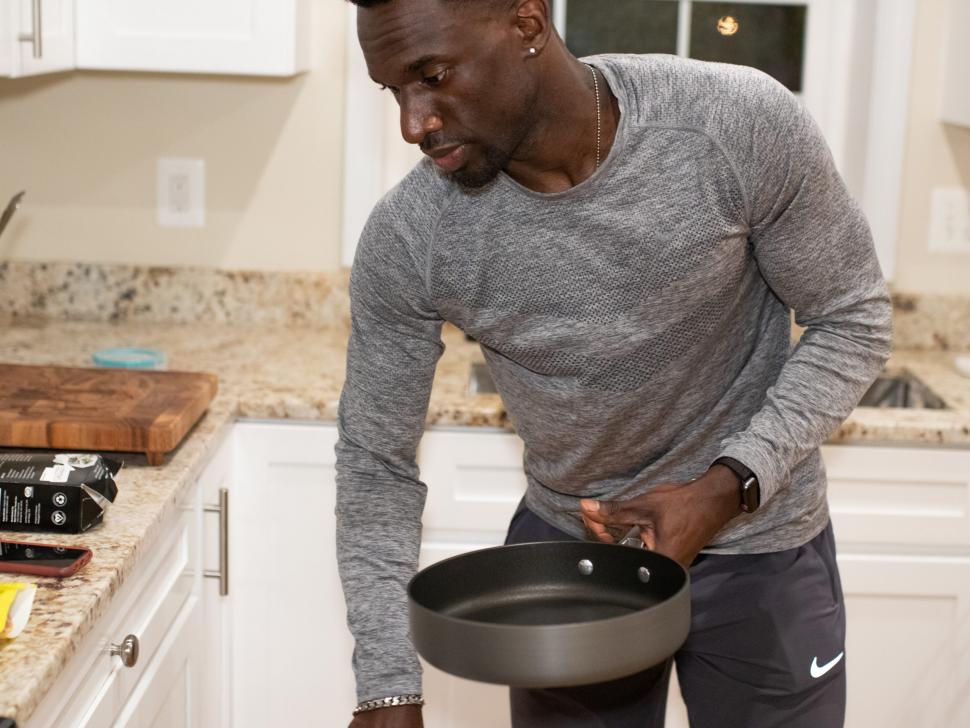 Free Image of Young Man With cooking pan 
