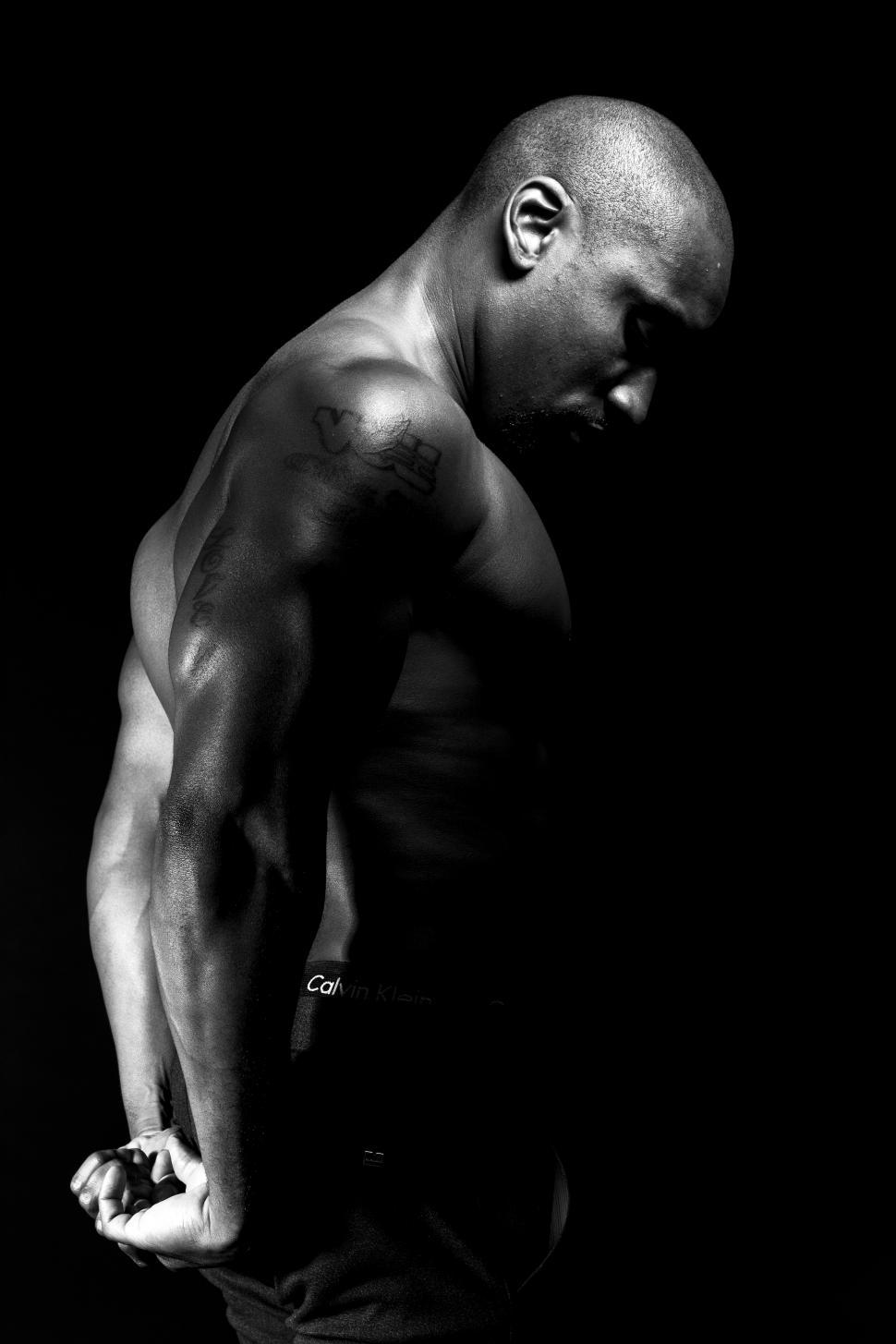 Free Image of Dark view of Male Bodybuilder 