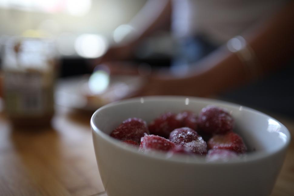Free Image of Bowl of Strawberries on wooden table 