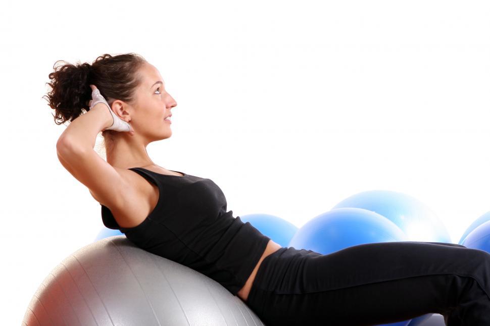 Free Image of woman doing fitness on exercise ball 