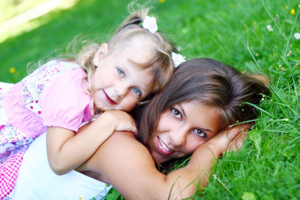 Free Image of Little girl with playing with her mom 