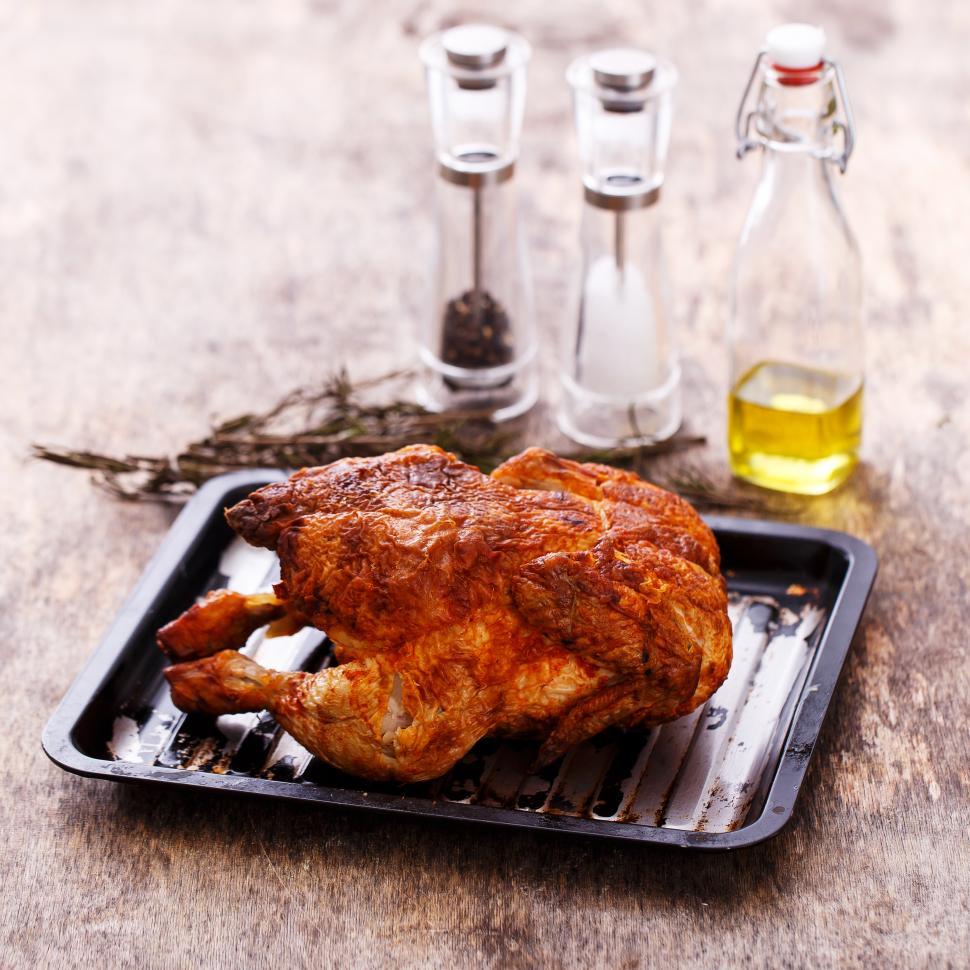 Free Image of Delicious roasted chicken on the table 