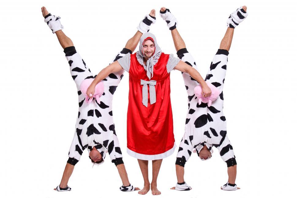 Free Image of Handsome guys in funny costumes as cows 
