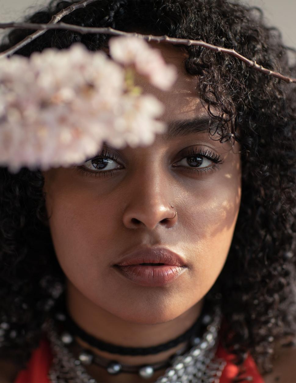 Free Image of Close up of young woman face with flowers 