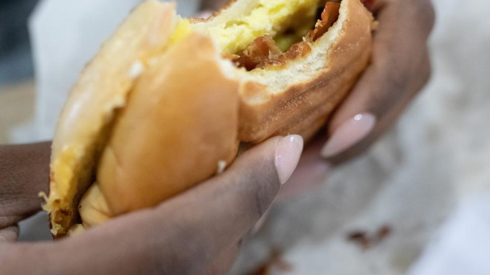 Free Image of Hands and burger bite 