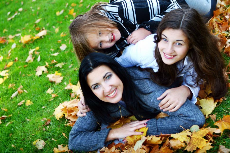 Free Image of Young family playing autumn park 