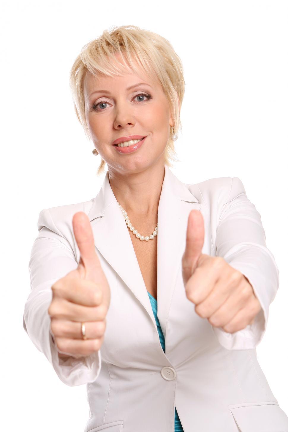 Free Image of woman gives two thumbs up 