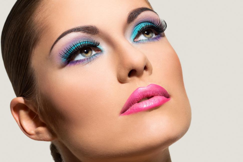 Free Image of Close up of woman with colorful makeup 