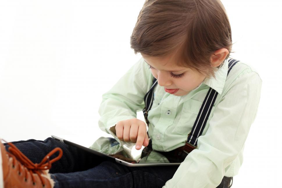 Free Image of Adorable kid using tablet device 