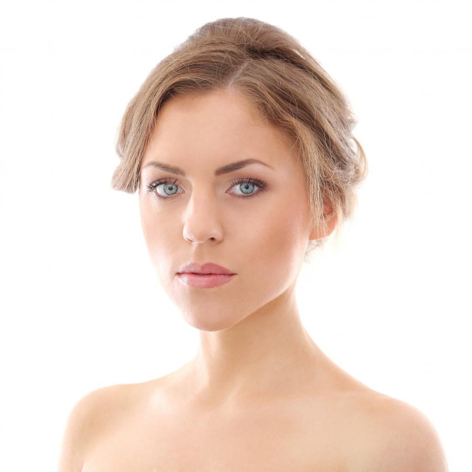Download Free Stock Photo of Head and shoulders shot of woman with hair up 
