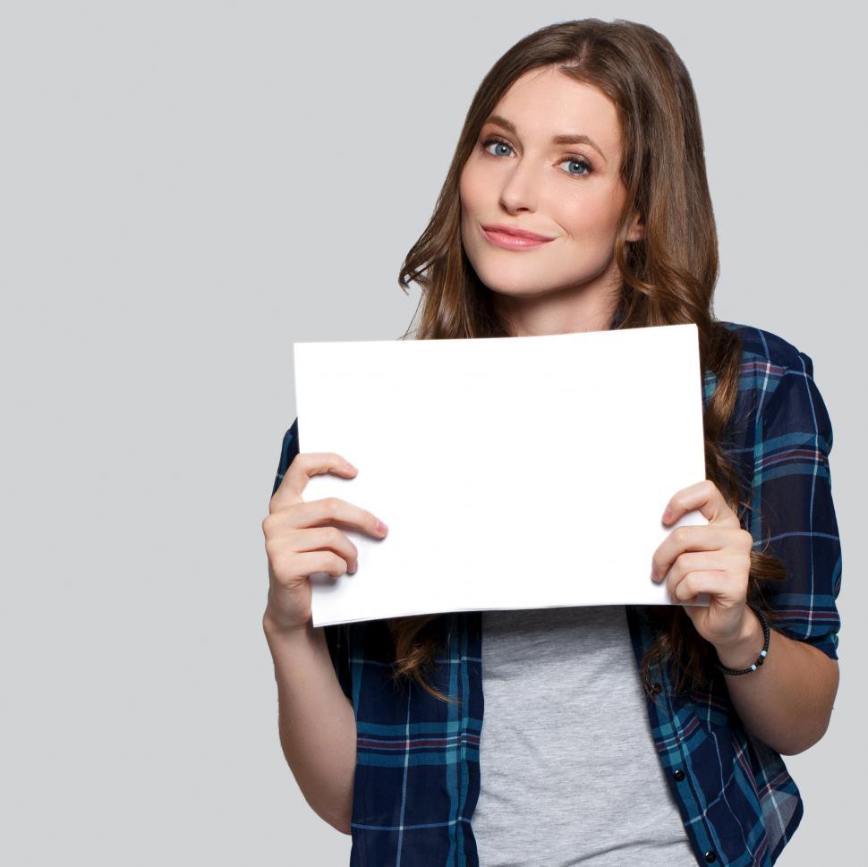 Free Image of Woman with blank white sign 