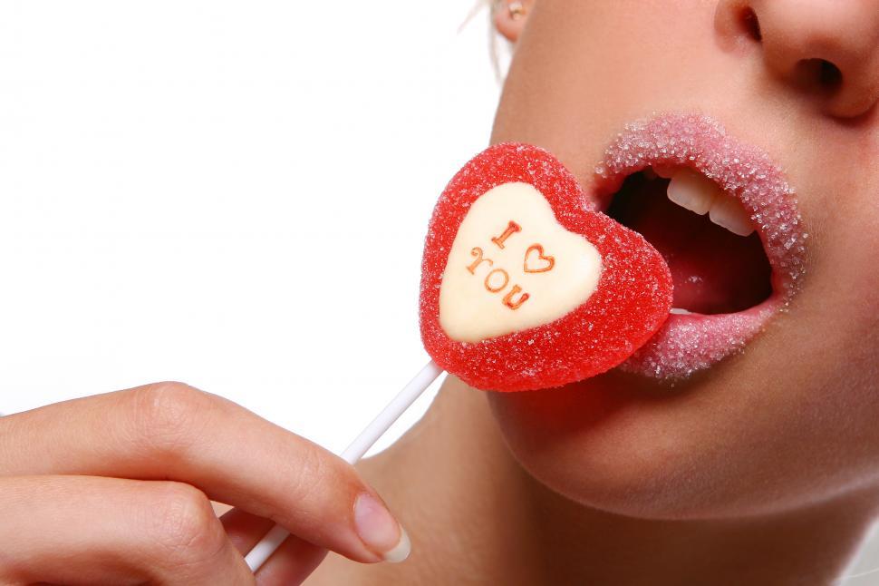 Free Image of beautiful attractive woman with lollipop 