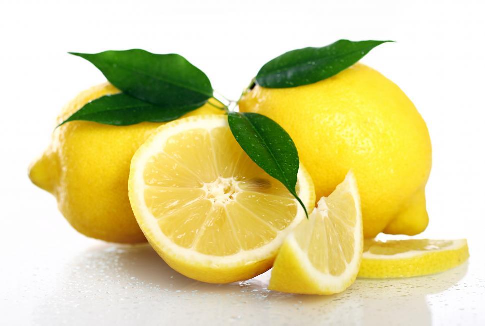 Free Image of Fresh yellow lemons on white background 