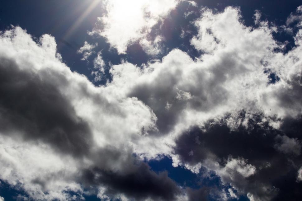 Download Free Stock Photo of Cloudy sky and sun 