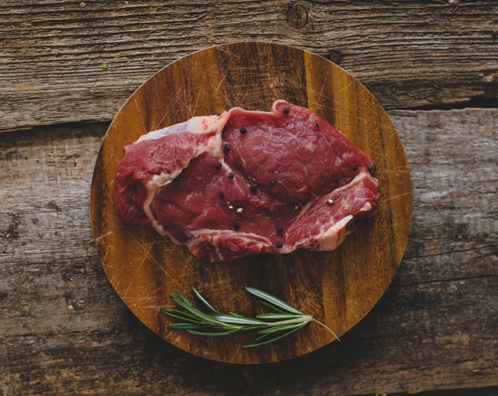 Free Image of Raw steak with rosemary 