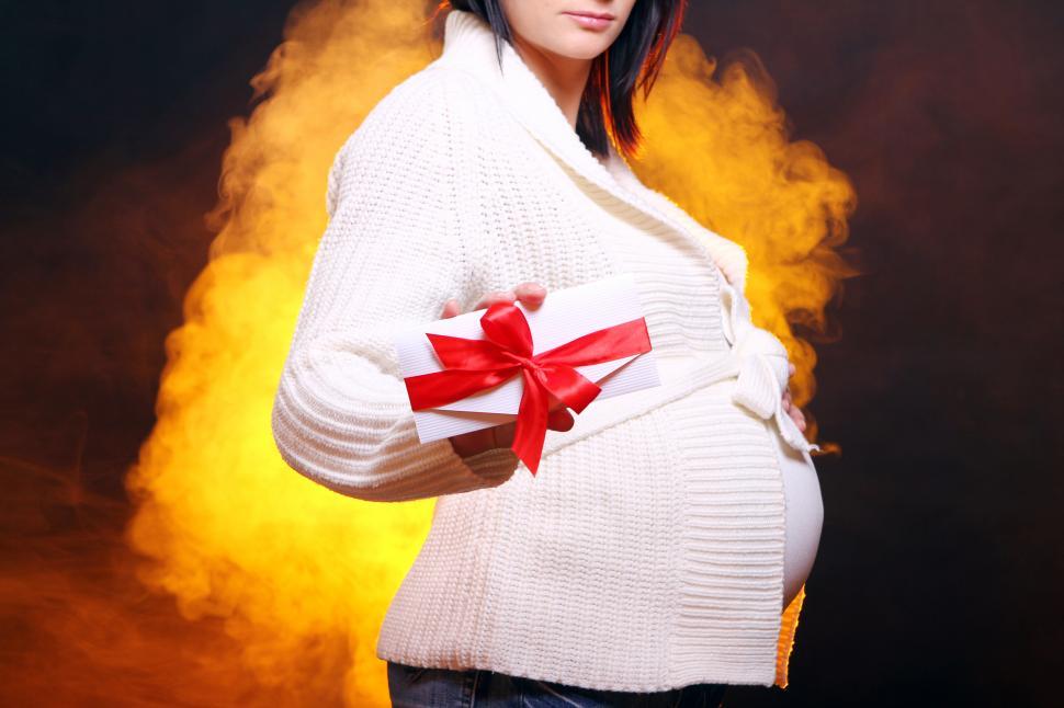 Free Image of Card presented by pregnant woman 