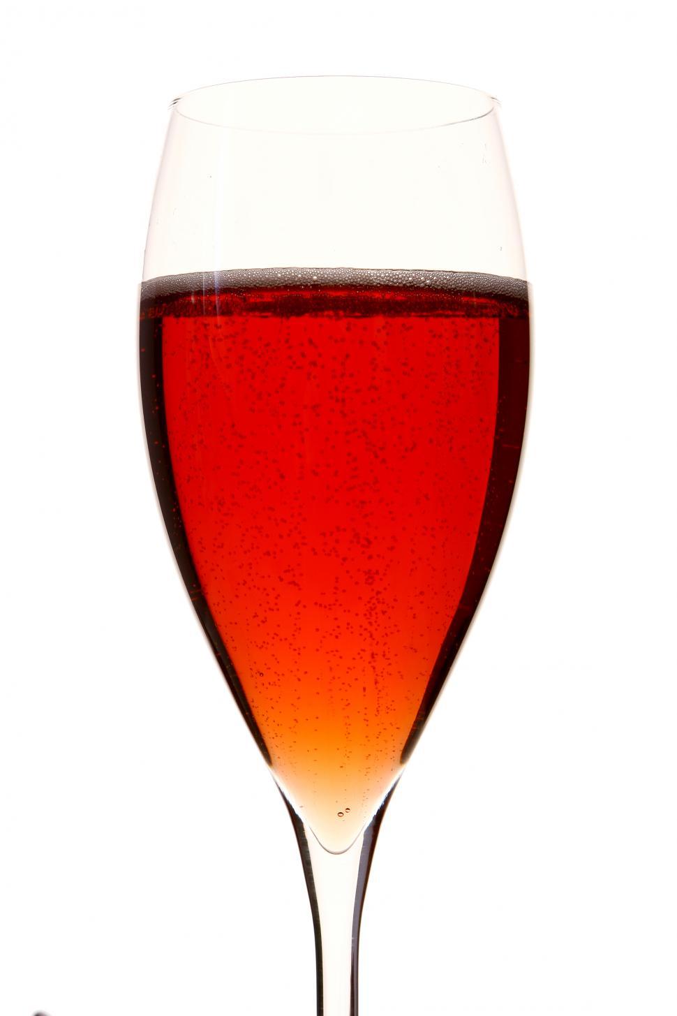 Free Image of a champagne glass with red alcohol beverage 
