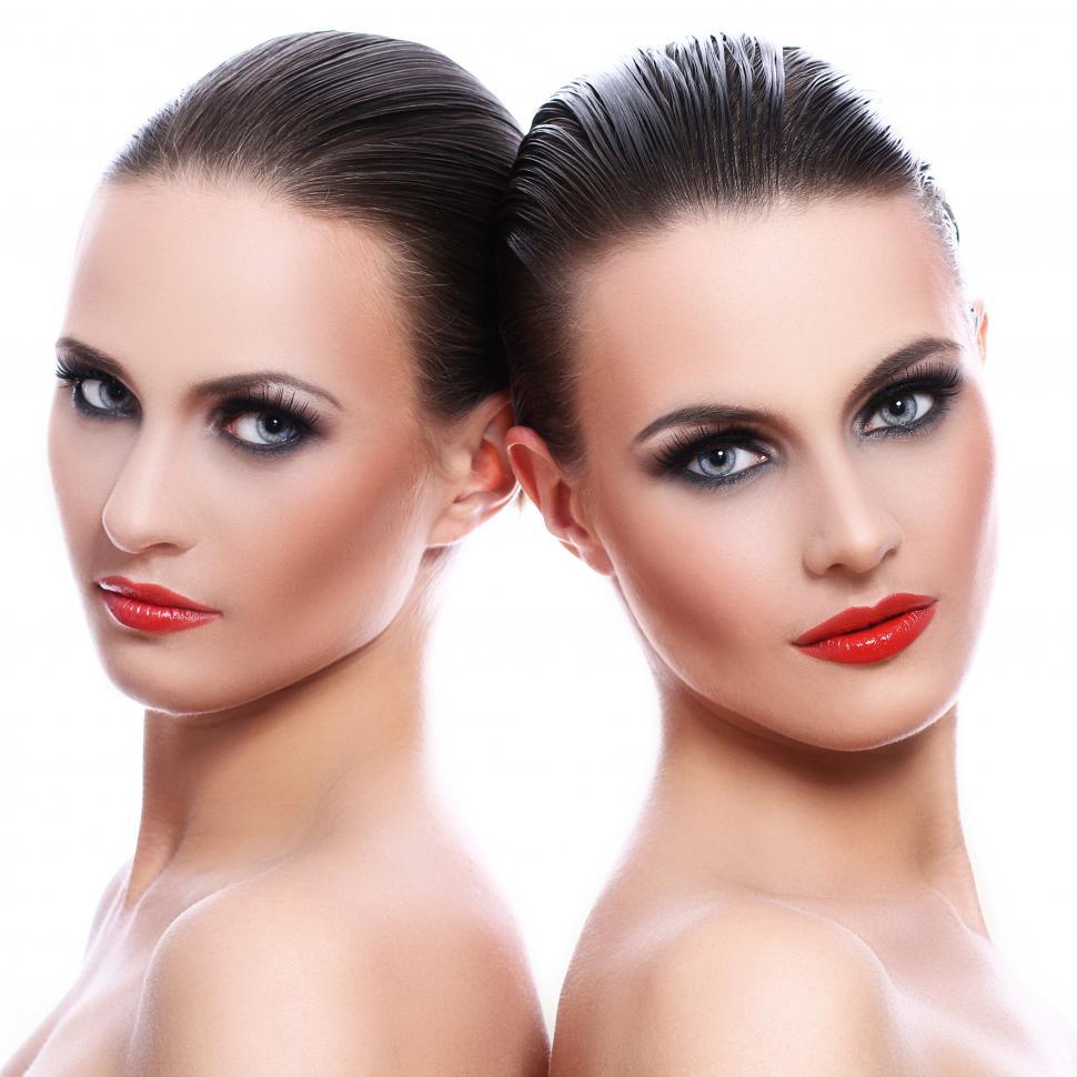 Free Image of Portrait of two women in full make up 