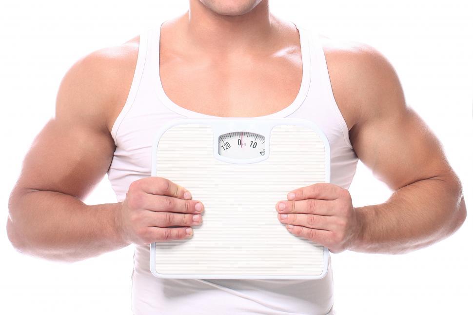 Free Image of Muscular guy with scales 