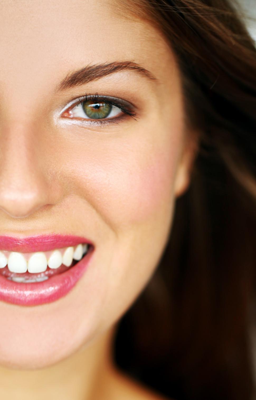 Free Image of Half face of happy young woman 