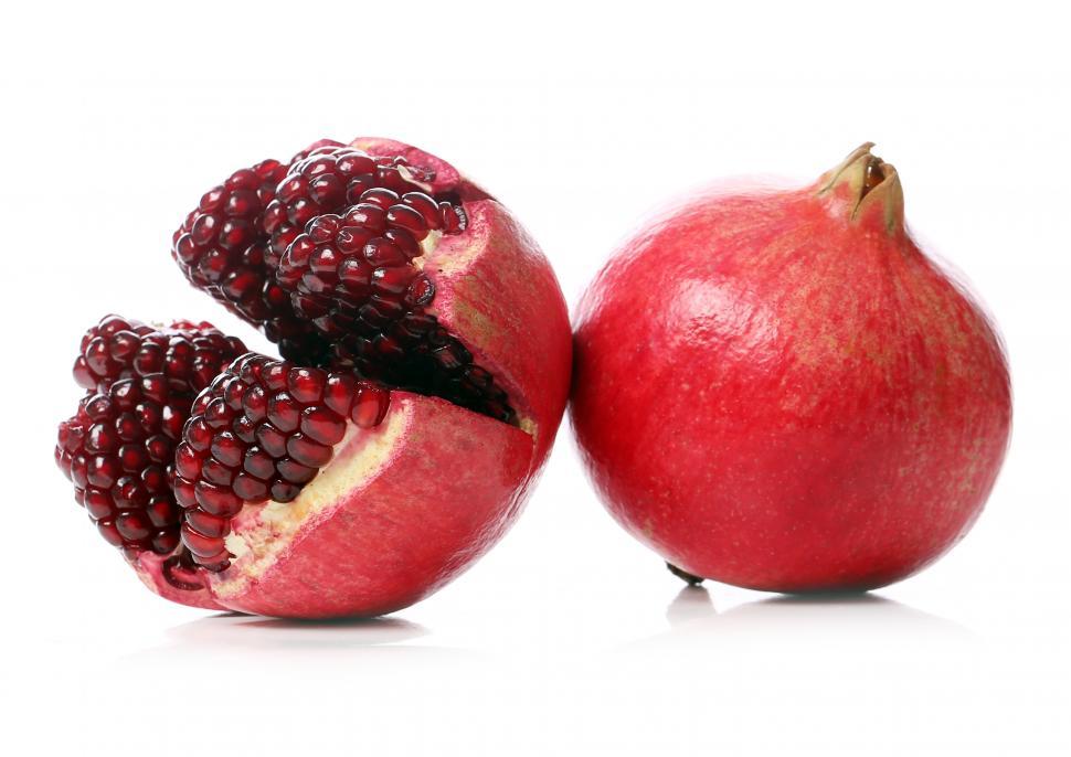 Free Image of Exotic and delicious pomegranate on white background 