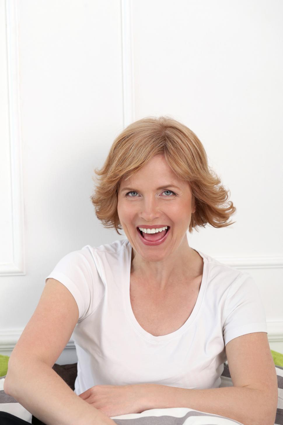 Free Image of Cheerful happy middle aged woman 