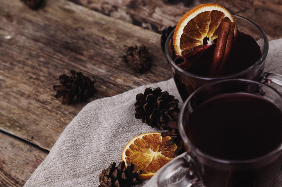Free Image of Glass of toddy or cider with orange and cinnamon 