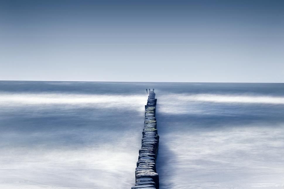 Free Image of Into the Blue - Stone Pier and Waves - Stepping Stones 