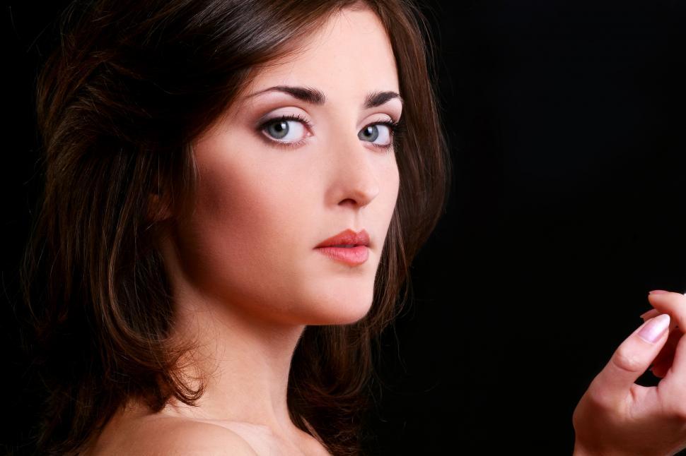 Free Image of Attractive young woman on black background 
