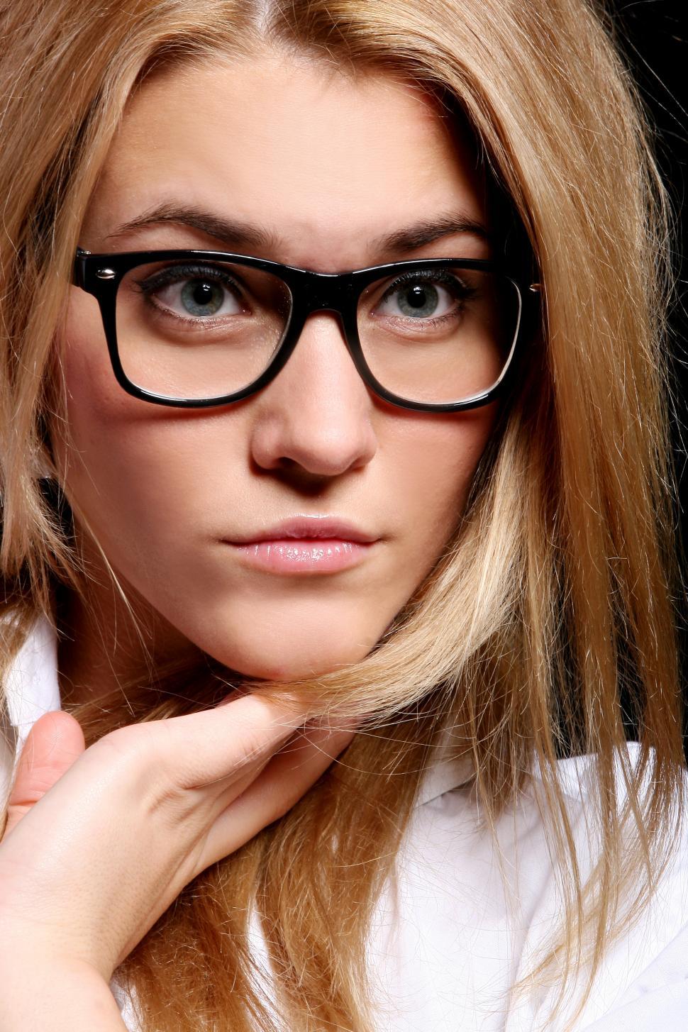 Free Image of Woman in glasses, looking at camera 