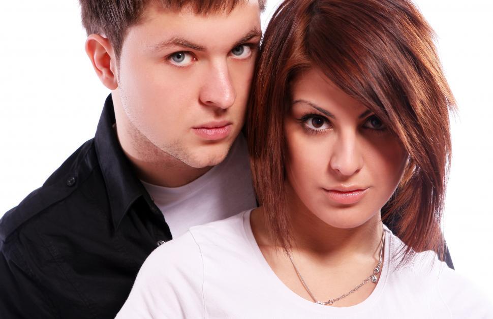 Free Image of Young and Happy Couple Looking Serious 