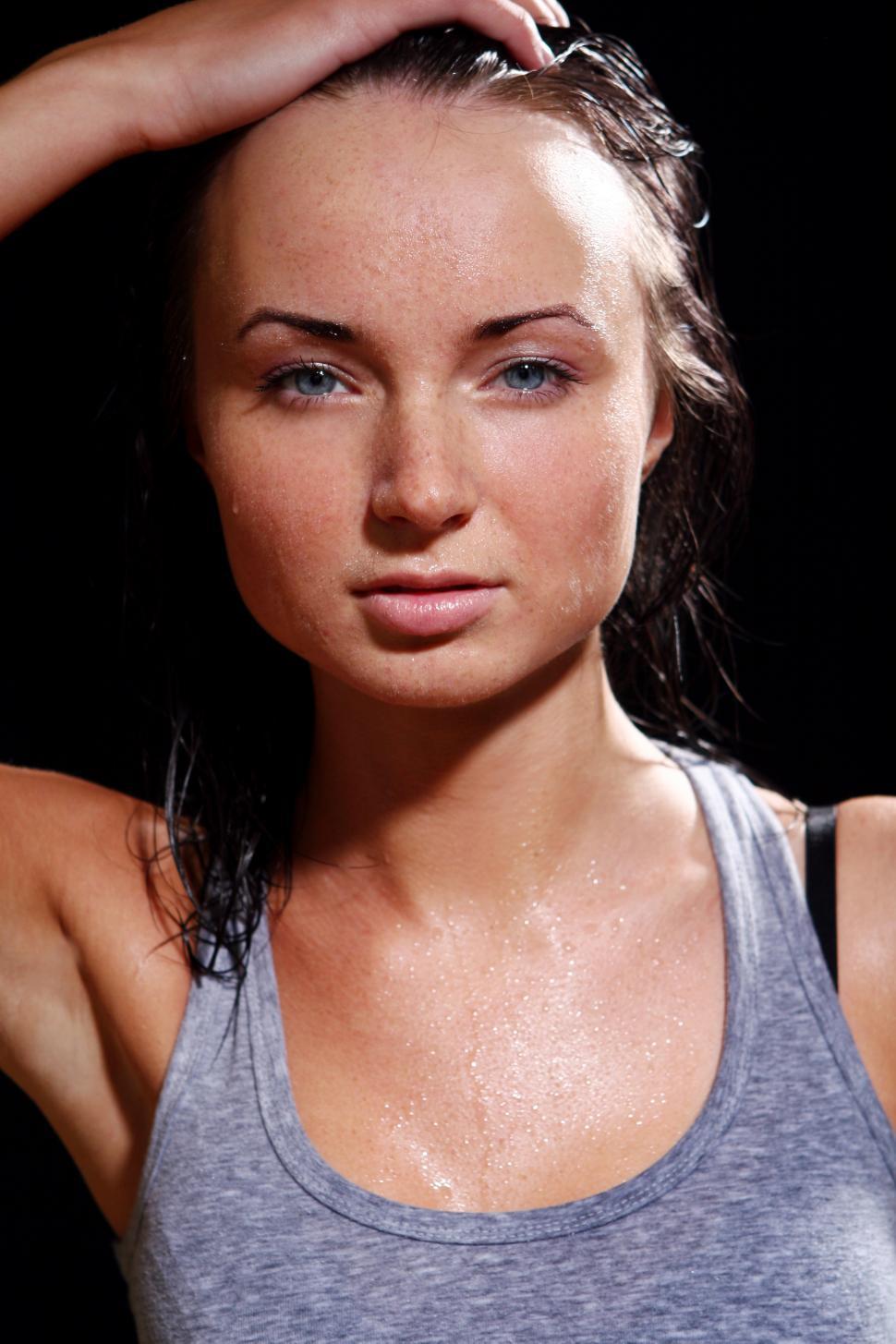 Download Free Stock Photo of Fit young woman worked up a sweat 