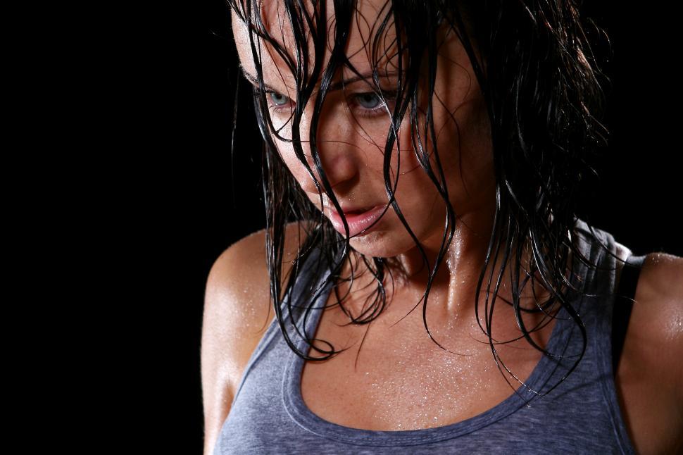 Download Free Stock Photo of Workout woman is very sweaty 