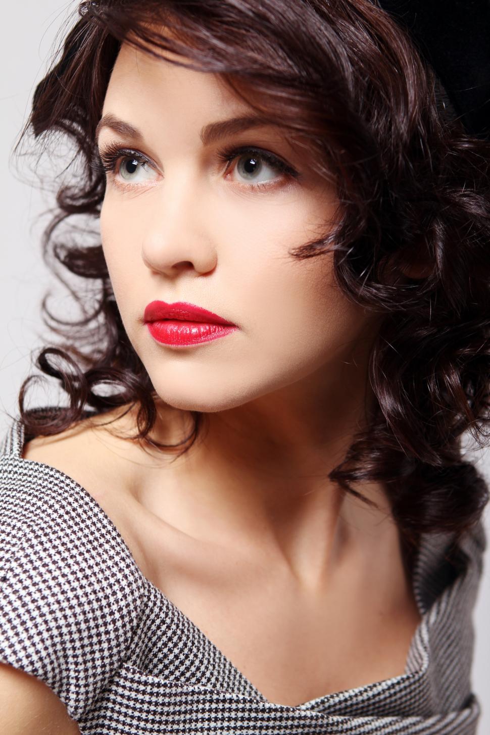 Free Image of Portrait of young beautiful lady looking off camera 