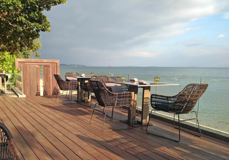 Free Image of Restaurant Table and Chairs by Ocean  