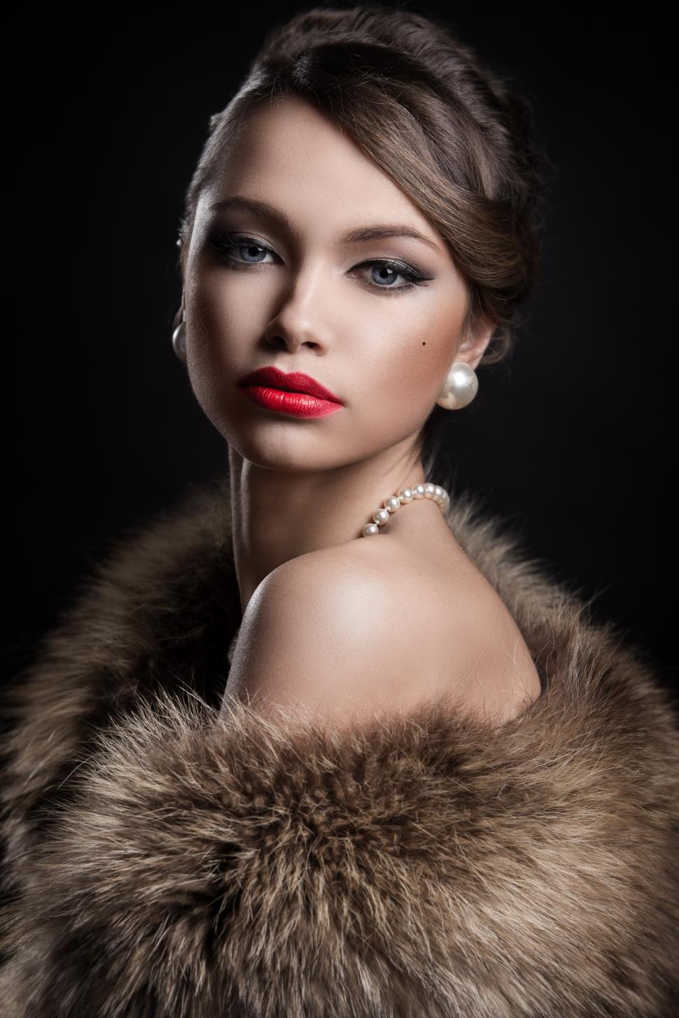 Free Image of Vintage, retro. Beautiful, attractive woman wearing fur 