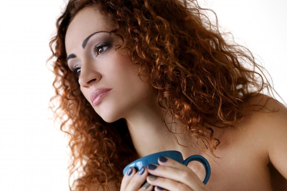 Free Image of Woman with a coffee mug 