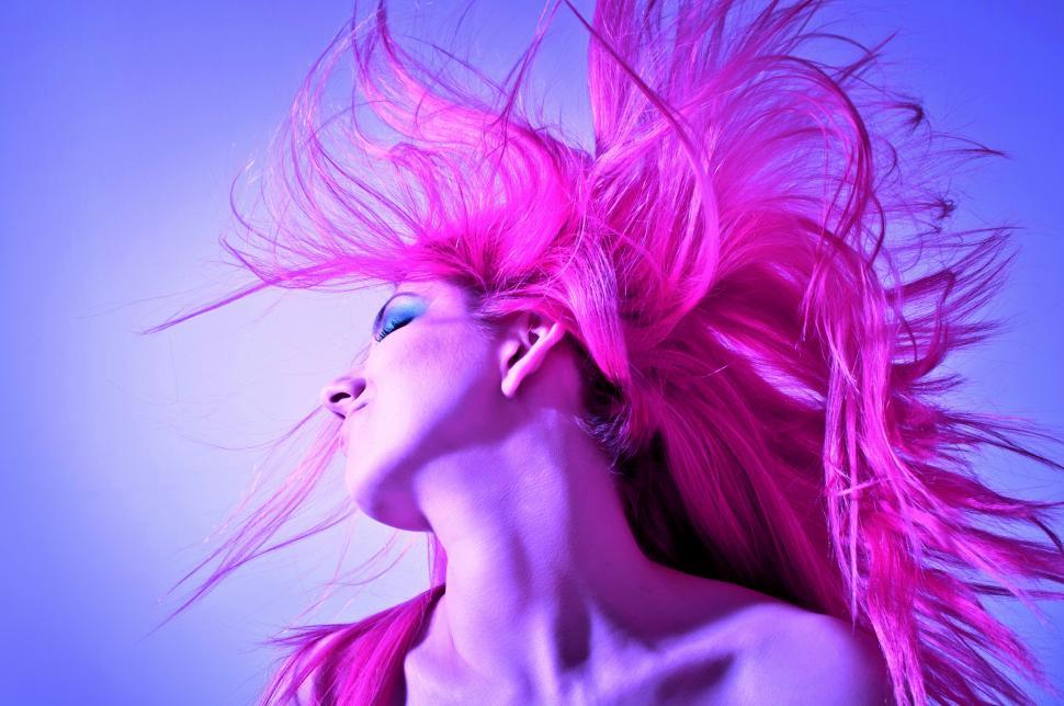 Free Image of Fashion Portrait of Young Beautiful Woman with Pink Hair 