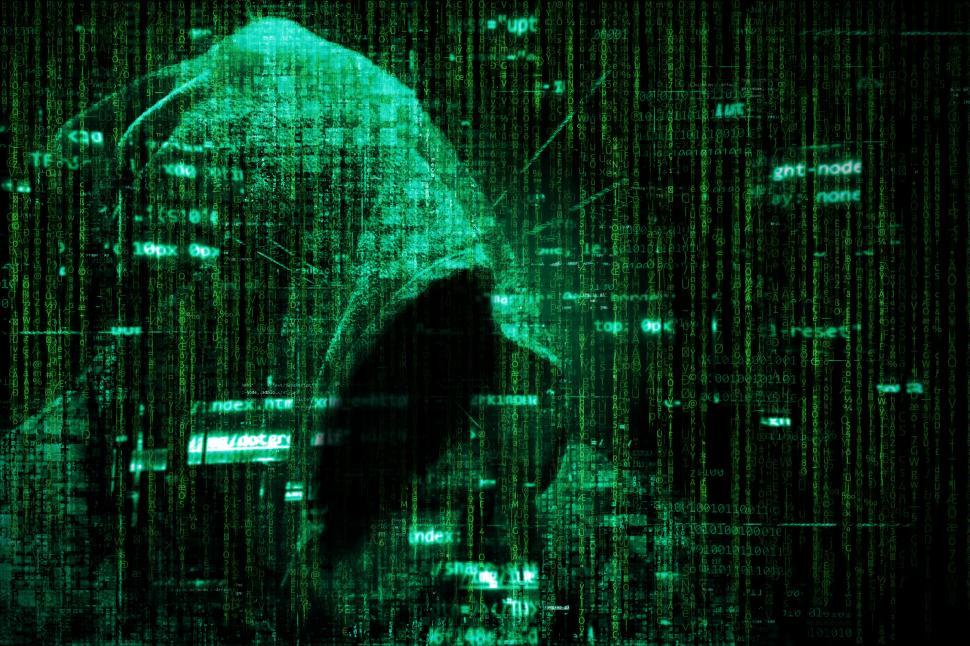 Download Free Stock Photo of Computer Hacker over Computer Code - Cyber Criminal 