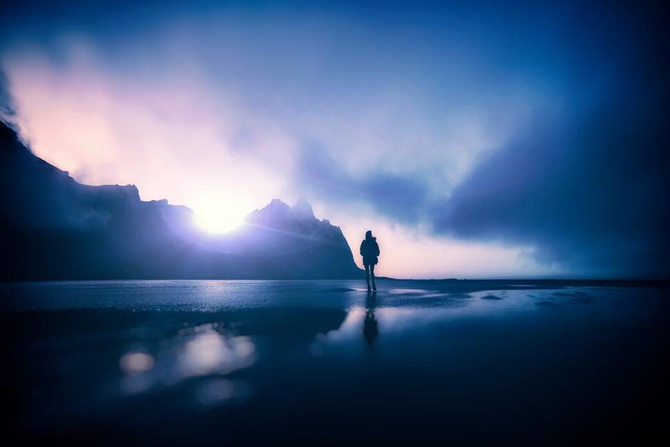 Download Free Stock Photo of Hiker Alone on Dark Foggy Beach 