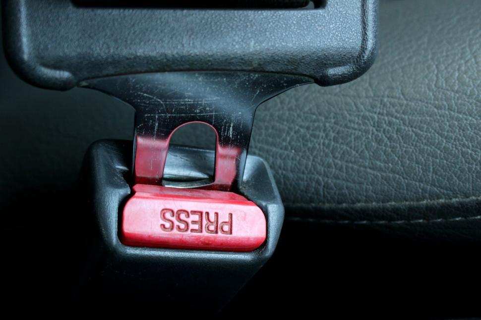 Free Image of Fastening a Car Seatbelt  